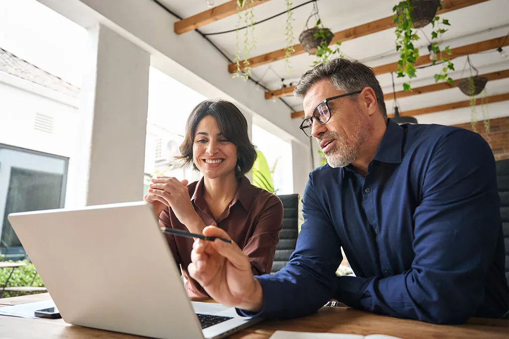 Real estate agent advising clients on property investment